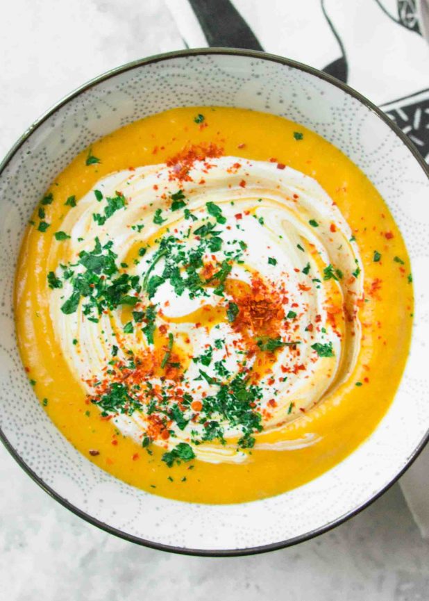 Slow Cooker Pumpkin Soup! So creamy and comforting with coconut milk. 