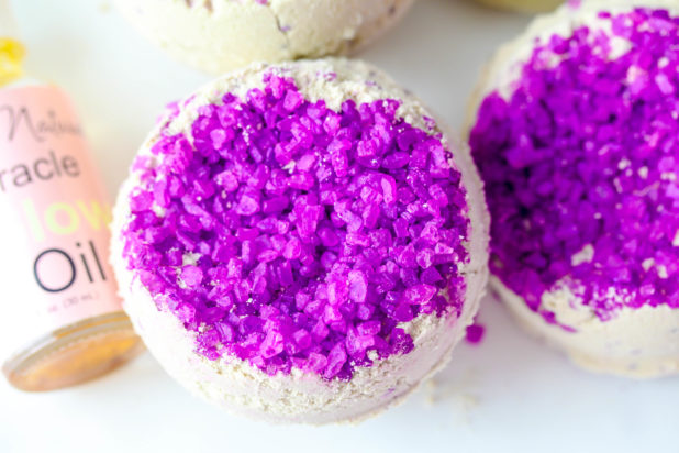  Amethyst Geode Bath Bomb is made using large crystal sea salts made with bentonite clay to detoxify and relax the body while clearing the mind. This #bathbomb is part of a birthstone collection that Shundara approved! 