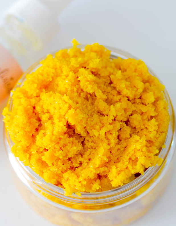 This simple citrus turmeric body scrub is made with all natural essential oils and a few simple ingredients to keep skin feeling soft! 