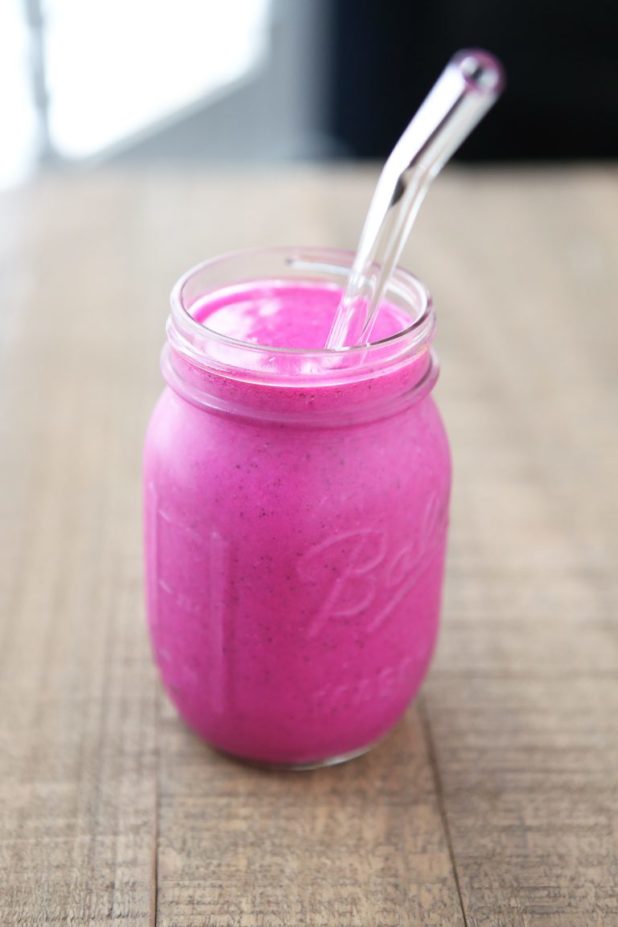  Loaded with bee pollen and sun butter this pink berry smoothie is to die for!