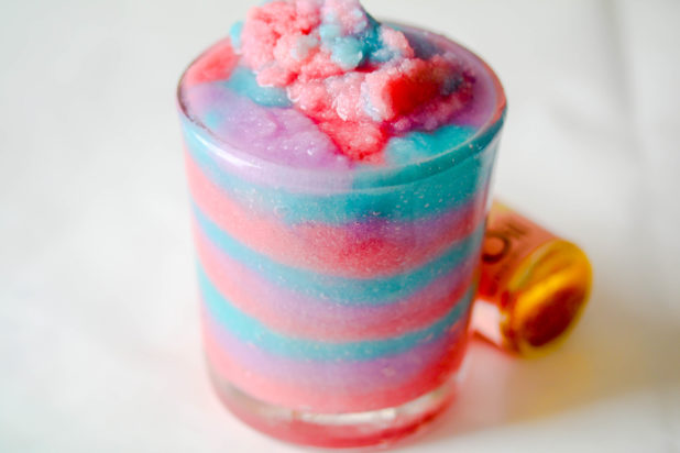 Make this easy Unicorn Frappuccino Body Scrub DIY! This festive sugar scrub not broke the internet because of its sweet notes, but it only requires a few simple ingredients that will make the perfect gift and shimmer the skin!