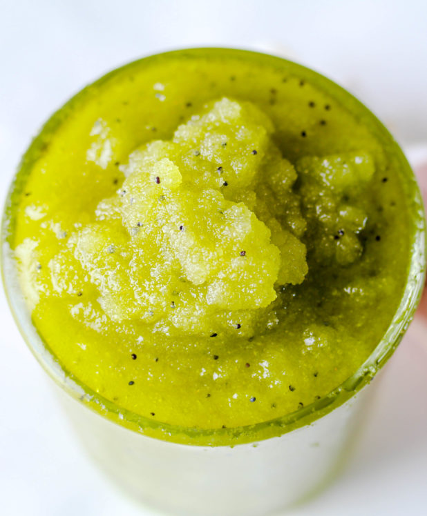 This kiwi moisturizing sugar scrub recipe for oily and dry skin is made with richly hydrating hemp seed oil and poppy seeds!