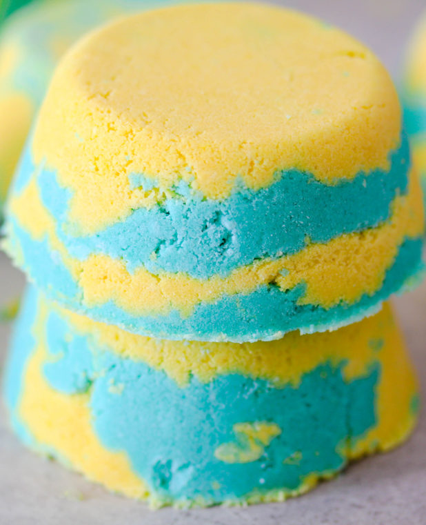 Lemon-Lime Bath Bombs are an invigorating blend of lime and lemon essential oil to make an all-natural refreshing bath bomb.  