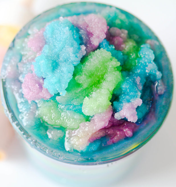 Make this easy Mermaid Body Sugar Scrub DIY! You can make this pretty mermaid scrub with only a few simple ingredients that will make the perfect baby shower or wedding gift to shimmer the skin! Savy Naturalista 