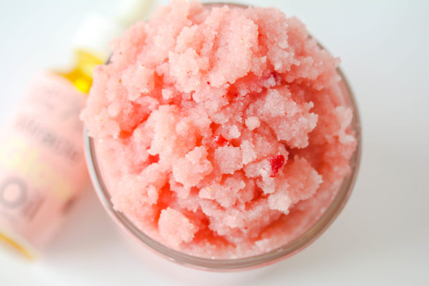 This homemade salt scrub is made with sunflower seed oil, strawberry oil, and dried strawberries that will make your skin feel soft and nourished!