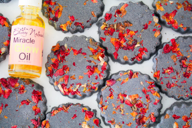 These Black Rose Petal Bath Bombs are made with real rose petals and activated charcoal are natural and smell pretty amazing!