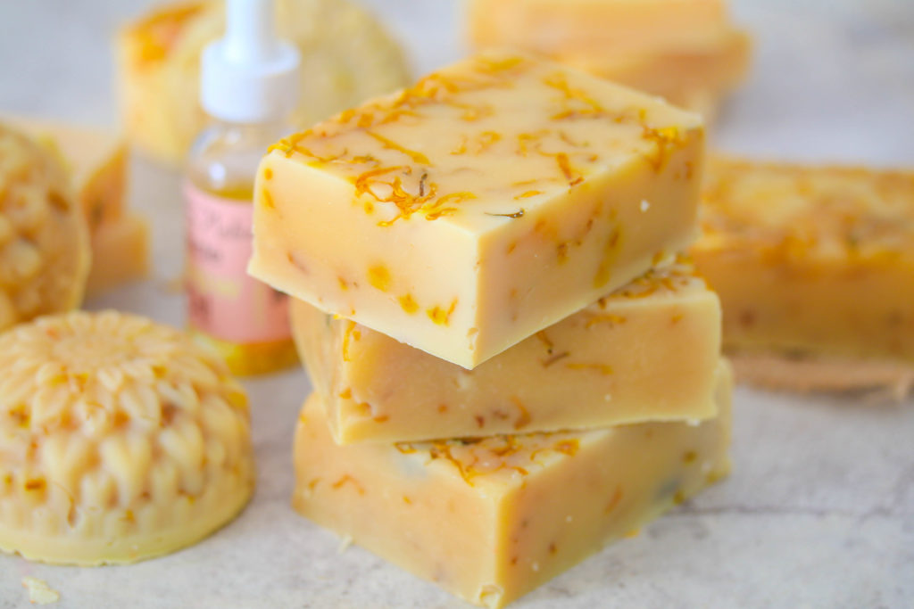 Calendula Oil Cold Process Soap is not only an easy beginner recipe, but it’s made with real calendula oil and flowers for an all-natural soap that is soothing and gentle to the skin! #skincare #soapmaking #soap #beginnersoapmaking #calendulasoap #DIY #miracleglowoil