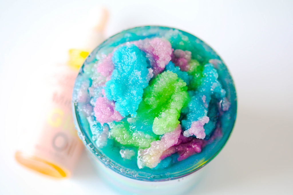 Make this easy Mermaid Body Sugar Scrub DIY! You can make this pretty mermaid scrub with only a few simple ingredients that will make the perfect baby shower or wedding gift to shimmer the skin! Savy Naturalista