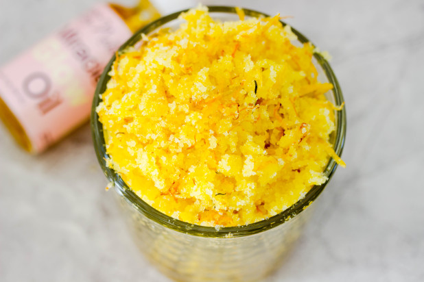 Made with pure salt crystals and all natural calendula petals! Make this easy Sweet orange salt scrub with 6 easy ingredients that are all natural.