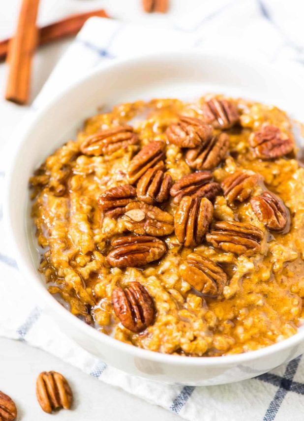 Easy, healthy steel cut oats, made in the slow cooker while you sleep! With pumpkin, cinnamon, and maple syrup.