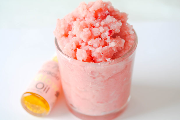 This homemade salt scrub is made with sunflower seed oil, strawberry oil, and dried strawberries that will make your skin feel soft and nourished!